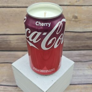 Hand-poured Cherry Coke soy candle in a recycled Coca-Cola can from 716 Candle Co.