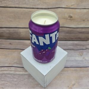 Upcycled Fanta Grape Soda soy candle in a soda pop can.