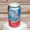 A soy candle poured into a wonderfully upcycled Hawaiian Punch can.
