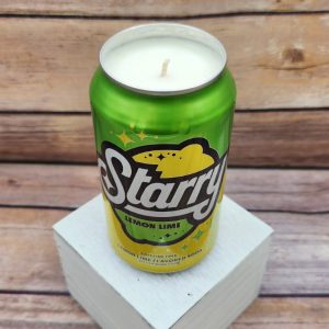 Candle poured in an upcycled Starry Soda Pop can with soy wax
