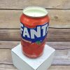 Upcycled Fanta Strawberry can holding a soy wax candle