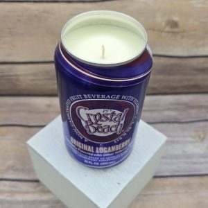 Decorative soy wax candle in an upcycled Crystal Beach can.