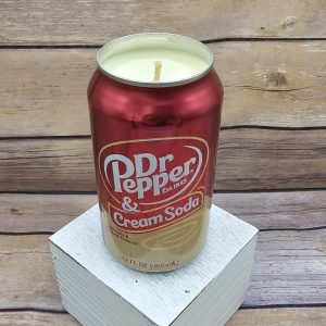 Featuring soy wax and hand-pouring, this Dr Pepper Cream Soda candle is in an upcycled can.