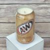 Hand-poured soy candle in an upcycled A&W Cream Soda can