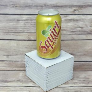 Soy wax candle poured into an upcycled Squirt soda can