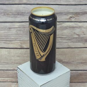 Upcycled Guinness Draught beer can candle close up view