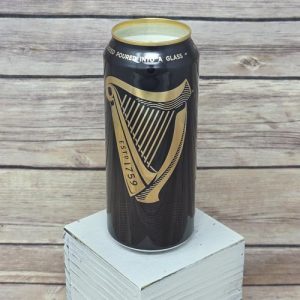 Soy wax candle in an upcycled Guinness Draught beer can, top view