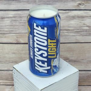 Upcycled beer can containing a Keystone Light Camo soy wax candle.