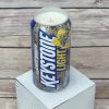Decorative soy candle inside an upcycled Keystone Light Camo beer can.