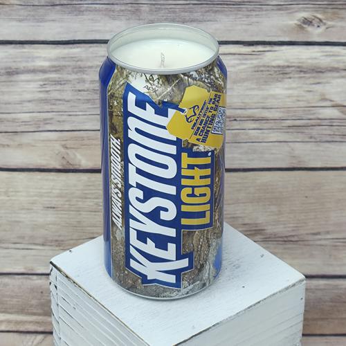 Keystone Light Camo beer can holding a soy wax candle.