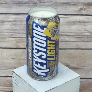Hand-poured soy wax candle shown with an upcycled Keystone Light Camo can label.