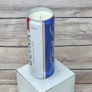 This soy wax candle is hand-poured and set in an upcycled Michelob Ultra can.