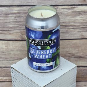 Handmade soy wax candle poured into an upcycled EBC Blueberry Wheat beer can.